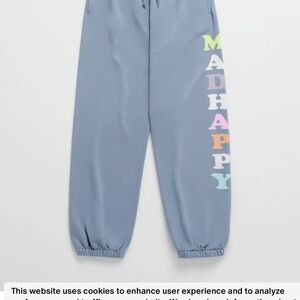 Madhappy Blue Sweatpants with Multicolor Logo